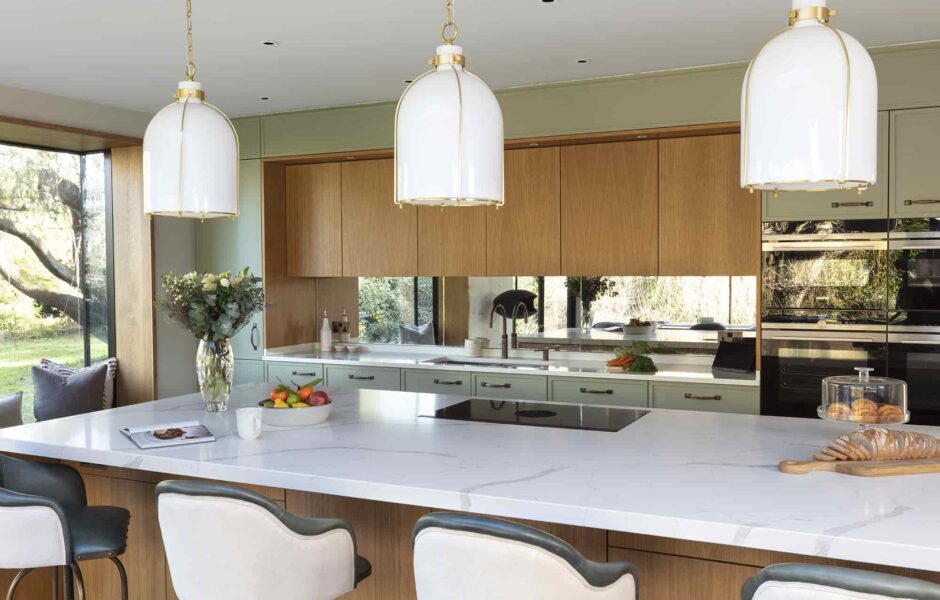 Contemporary Green and Stained Oak Skinny Shaker kitchen with waterfall island